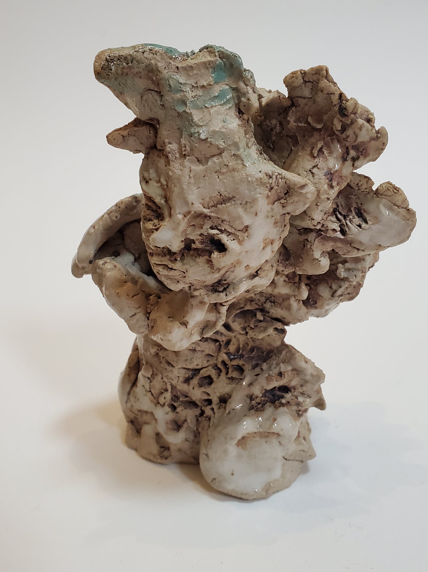 Set of 2 miniature ceramic sculptures, female figure with fish and shadow, figure with double-headed snake
