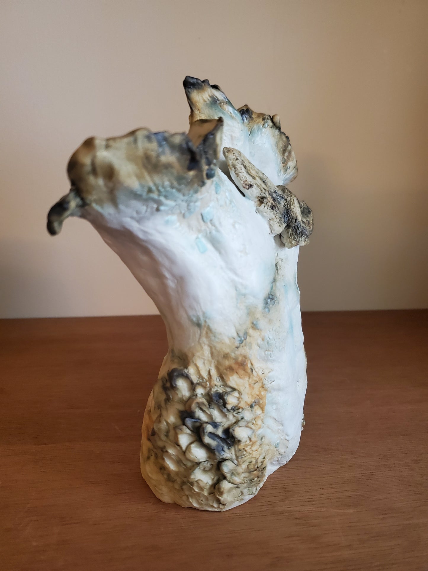 Male torso with moth, small ceramic figure sculpture