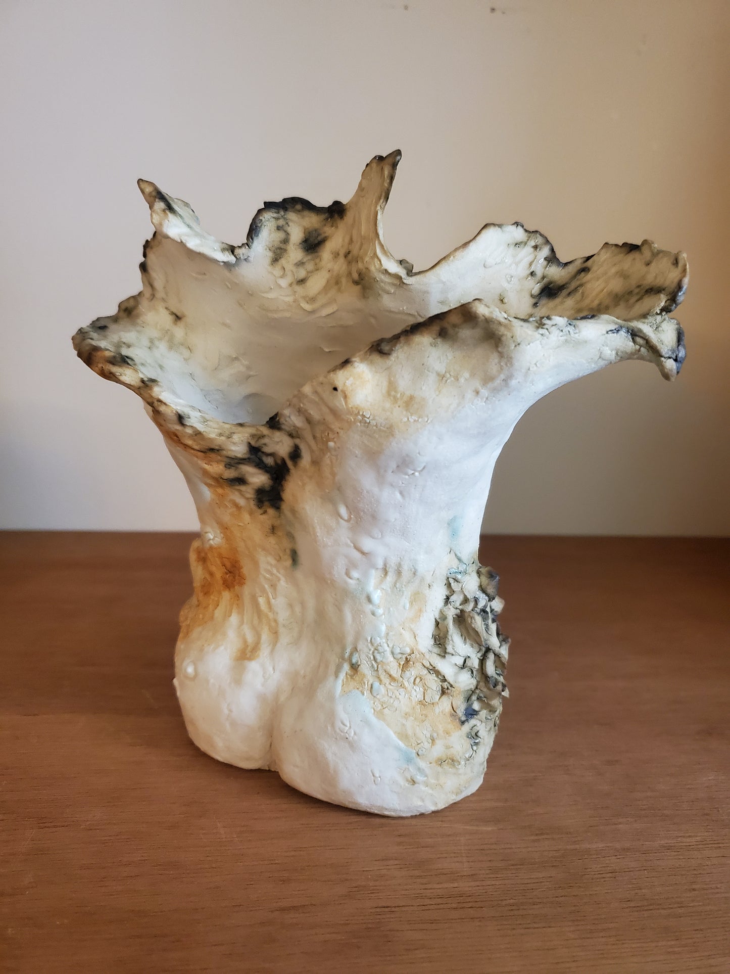 Male torso with moth, small ceramic figure sculpture